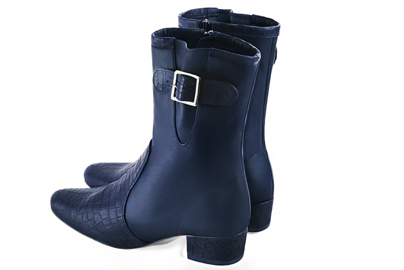 Navy blue women's ankle boots with buckles on the sides. Round toe. Low block heels. Rear view - Florence KOOIJMAN